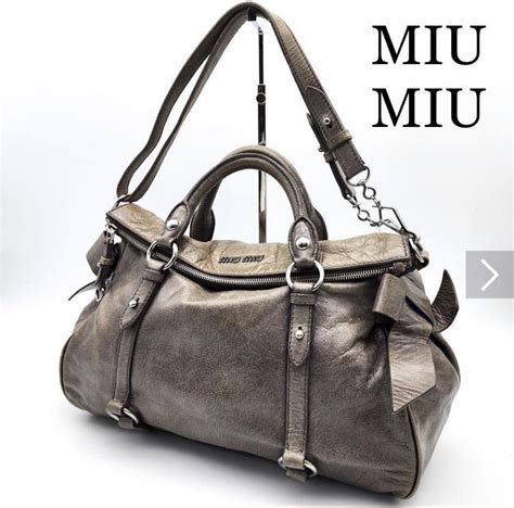 miu miu bow bag fake|are miu miou bags real.